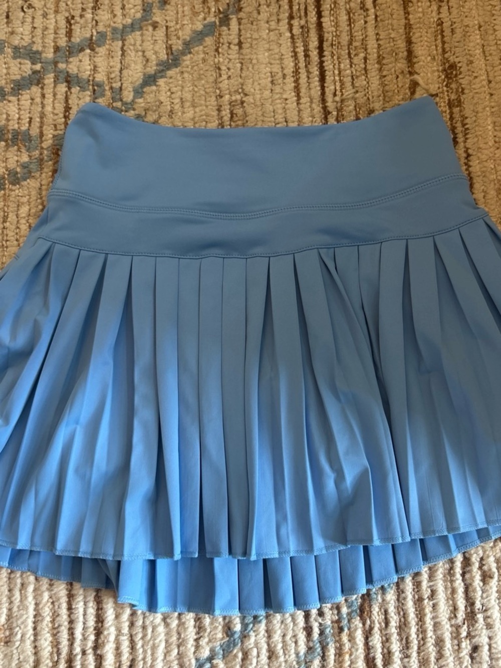 Gold hinge Pleated Performance Skirt - Light Blue.  Size small